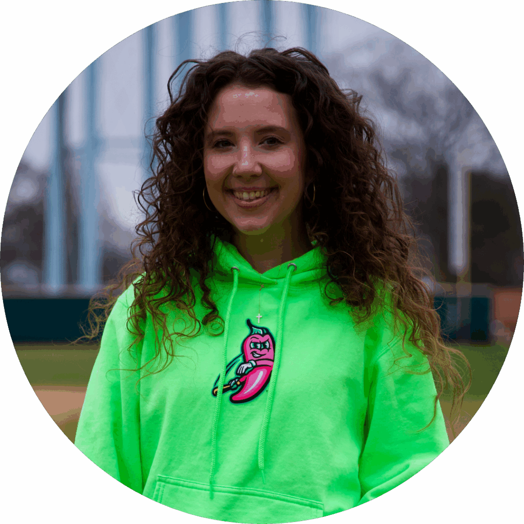 Headshot of Emily Wade, Merchandise Associate at Cosmic Baseball