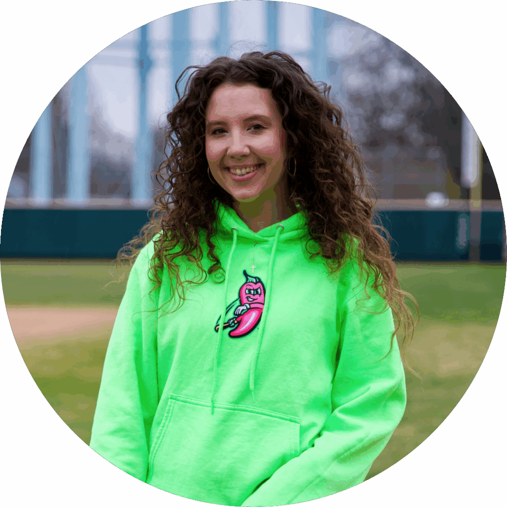 Headshot of Emily Wade, Merchandise Associate at Cosmic Baseball